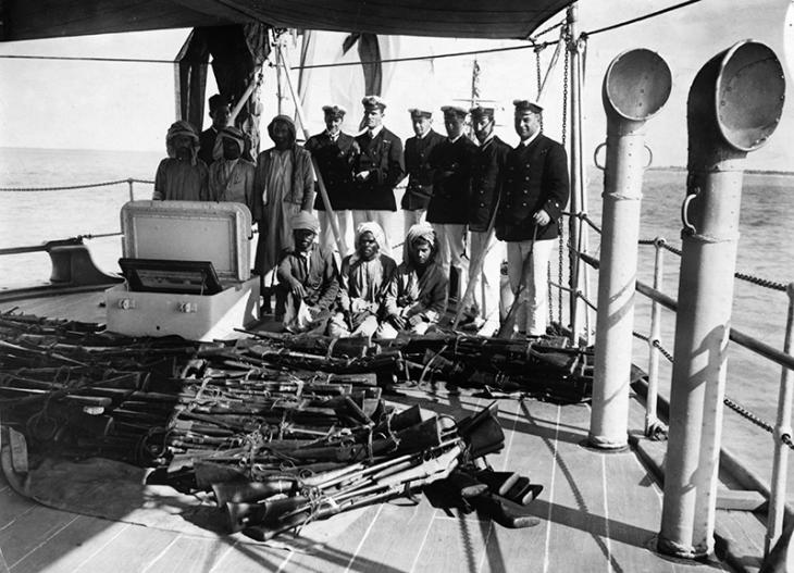 The Dubai Incident: rifles surrendered by the Sheikh of Dubai, displayed on the deck of HMS Fox. Library of Congress Prints and Photographs Online Catalog (Public Domain)