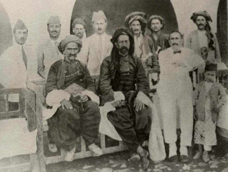 Photograph including Shaikh Mahmud Barzanji, (seated, centre), 1927. Public Domain 