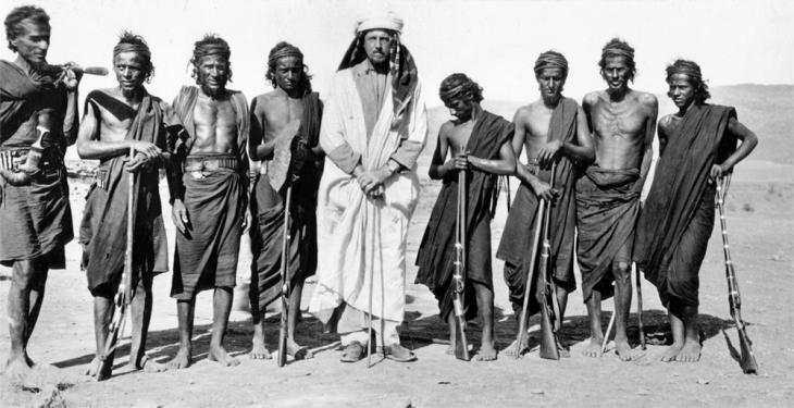 Bertram Thomas, pictured with local tribespeople, c.1930-31. Image courtesy of Mark Evans, Crossing the Empty Quarter 2015