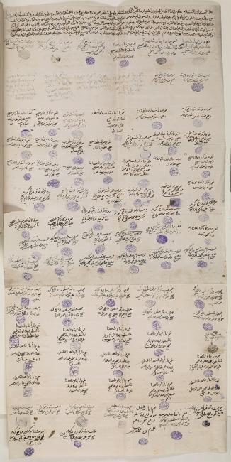 View of the full, unfolded document bearing the witness statement and signatures of ninety men, of which eighty-three are described as prominent inhabitants. IOR/R/15/1/235, f. 60