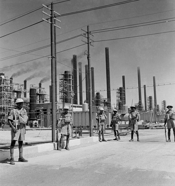 British guards patrolling the Anglo-Iranian Oil Company refinery at Abadan, in the wake of the Anglo-Soviet invasion of Iran in August 1941. Source: Imperial War Museum (E 5329)