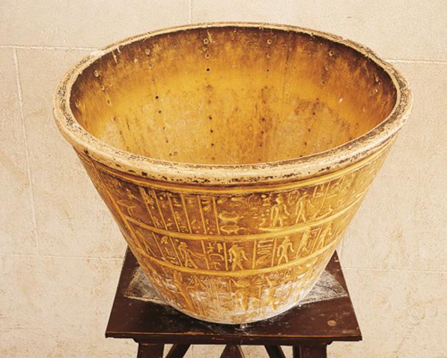 Egyptian water-clock. Copy of a conical alabaster vase with columns of 12 holes. Astronomical signs decoration on the outer surface. Image courtesy of Getty Images DEA Picture Library